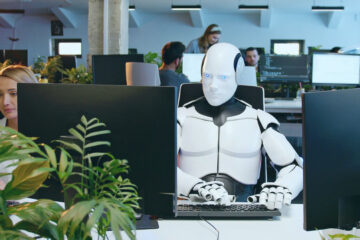 Imaginea ilustrează cum VEROBIT SRL utilizează inteligența artificială pentru a eficientiza munca de birou, subliniind colaborarea dintre oameni și AI.